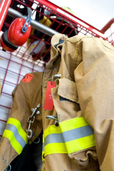 Photoluminescent tape in firefighter suit