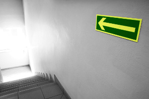 Photoluminescent sign-arrow pointing direction of exit